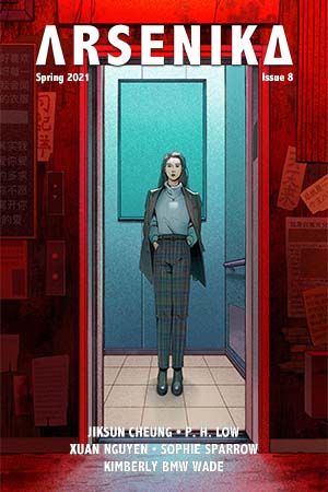 A person standing in a red doorway